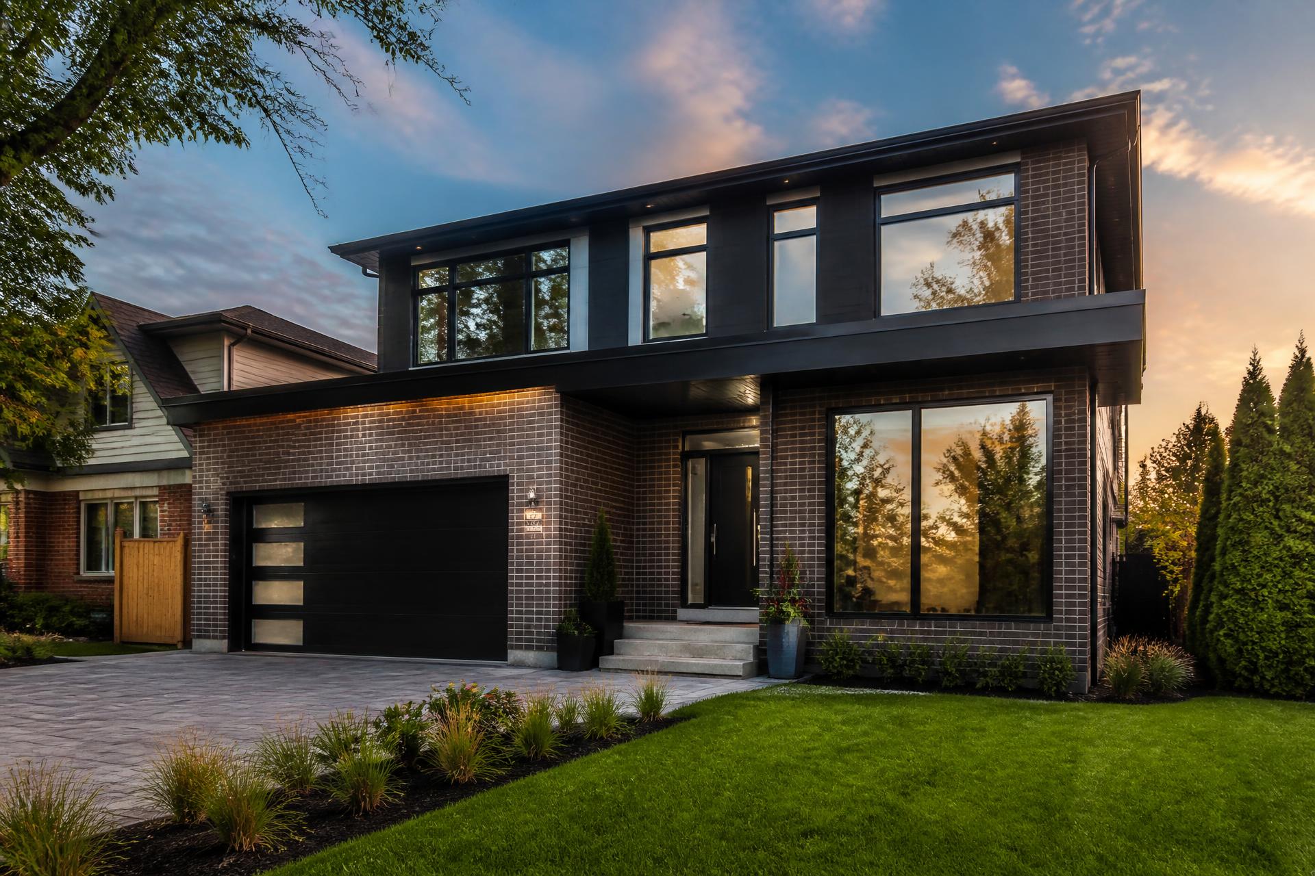 Modern Toronto home with sparkling clean windows at golden hour